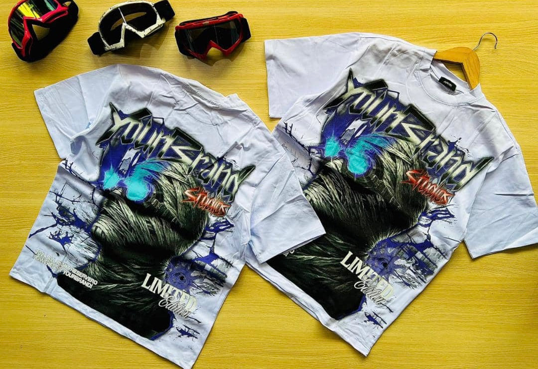 YoungBrand Studios Limited Edition Graphic T-Shirt in white, featuring a bold streetwear design with a futuristic blue and black graphic, abstract artwork, and stylish typography. Perfect for urban fashion and trendy casual wear